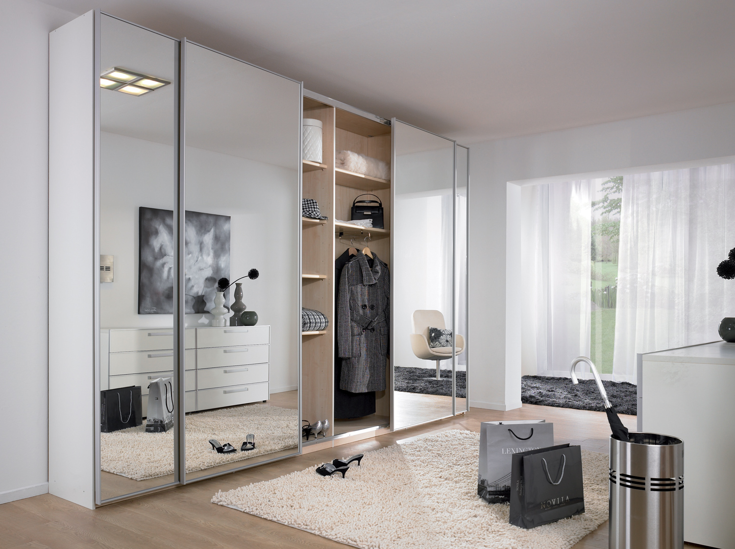 Reflective closet door panels